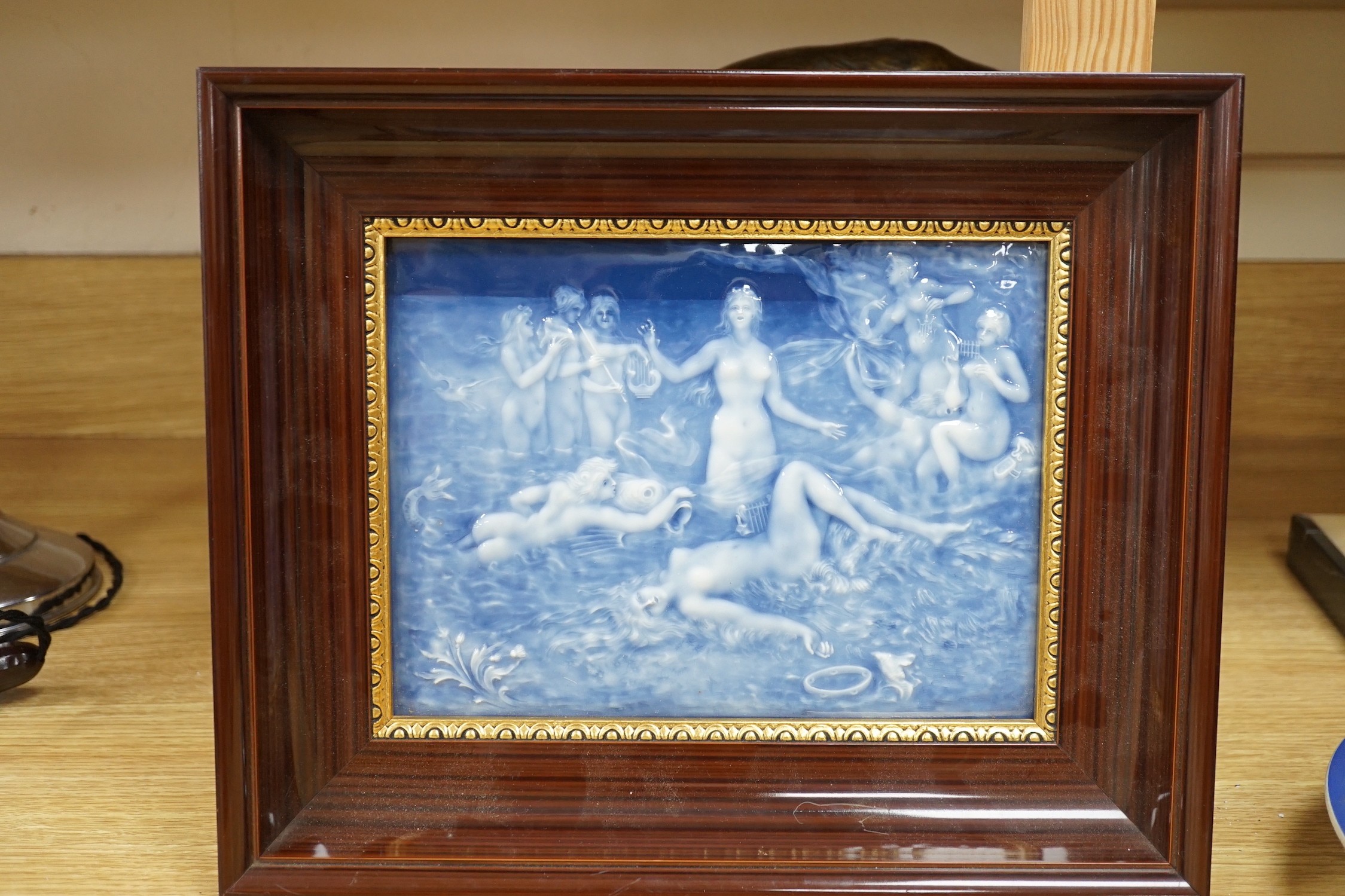 A Limoges style pate sur pate plaque, early 20th century, depicting sirens, plaque 17.5 X 23.5 cm excluding frame